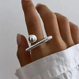 Chic Minimalist Sphere and Bar Ring