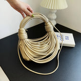 Defini Sculptural Cascading Cords Bag