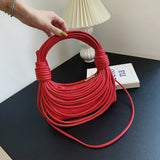 Defini Sculptural Cascading Cords Bag