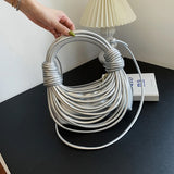 Defini Sculptural Cascading Cords Bag