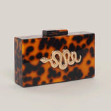 Luara Tortoiseshell Metal Snake Accent Clutch