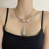Lyra Sculptural Crystal Water Drop Pendant Collar Necklace