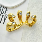 Manuel Sculptural Hand Armor Ring