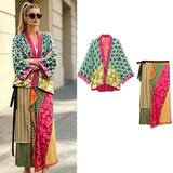 A woman modeling a colorful patchwork kimono-style cardigan and matching tie-waist skirt, shown alongside flat product views of the top and skirt on a white background. The garment features multiple bright patterned panels in pink, green, yellow, orange, and beige.