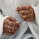 Chic Minimalist Sphere and Bar Ring