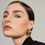 Viva Golden Curved Disks Hoop Earrings