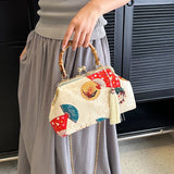 Ilta Kimono Prints Bamboo Handle Clutch Bag
