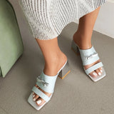 Karla Bow Tie Serpentine Mule Sandals