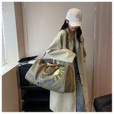 Pillo Canvas Graphic Print Duffle Bag