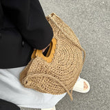 Sema Woven Straw Half Moon Bag