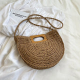 Sema Woven Straw Half Moon Bag
