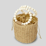 Aerin Beads Handle Straw Mini Bucket Bag