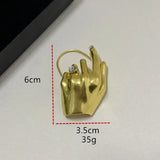 Lyke Sculptural Hand Ear Cuff