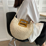 Sema Woven Straw Half Moon Bag