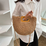 Sema Woven Straw Half Moon Bag