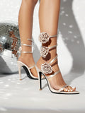 Ines Rosette Wrap Around Stiletto Sandals