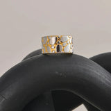 Metallic Hide Pattern Statement Band Ring