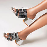 Karla Bow Tie Serpentine Mule Sandals