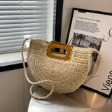 Sema Woven Straw Half Moon Bag