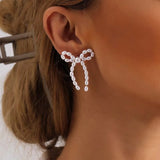 Wella Pearl Bowknot Stud Earrings
