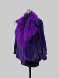 A purple velvet jacket with a voluminous purple feather collar, displayed on a black dress form mannequin against a solid gray background.